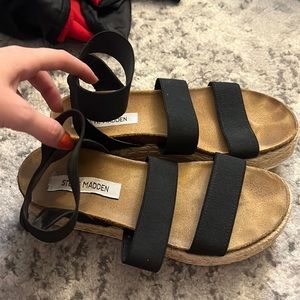 Black sandals with espadrille bottoms